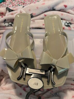 BCBGeneration Cream Bow Jelly Slide Sandals